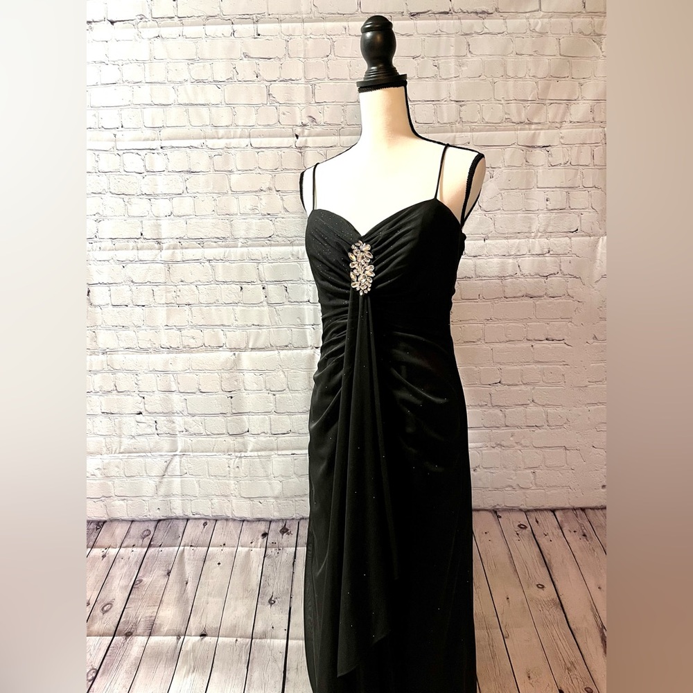 Black floor length evening gown with spaghetti straps